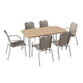 "Eettafel met Zes Stoelen van Wicker"
